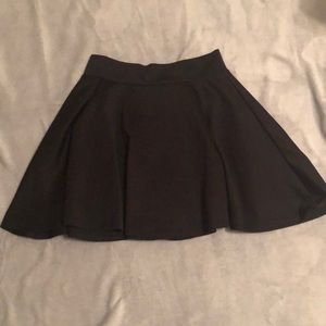 Short Black skater skirt.
